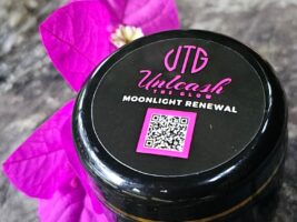Wellspring UTG pot of Moonlight Renewal night cream with Bougainvillea flowers